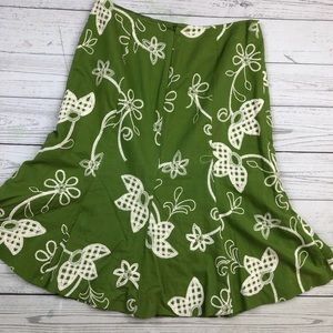 Embroidered green trumpet bottom skirt.